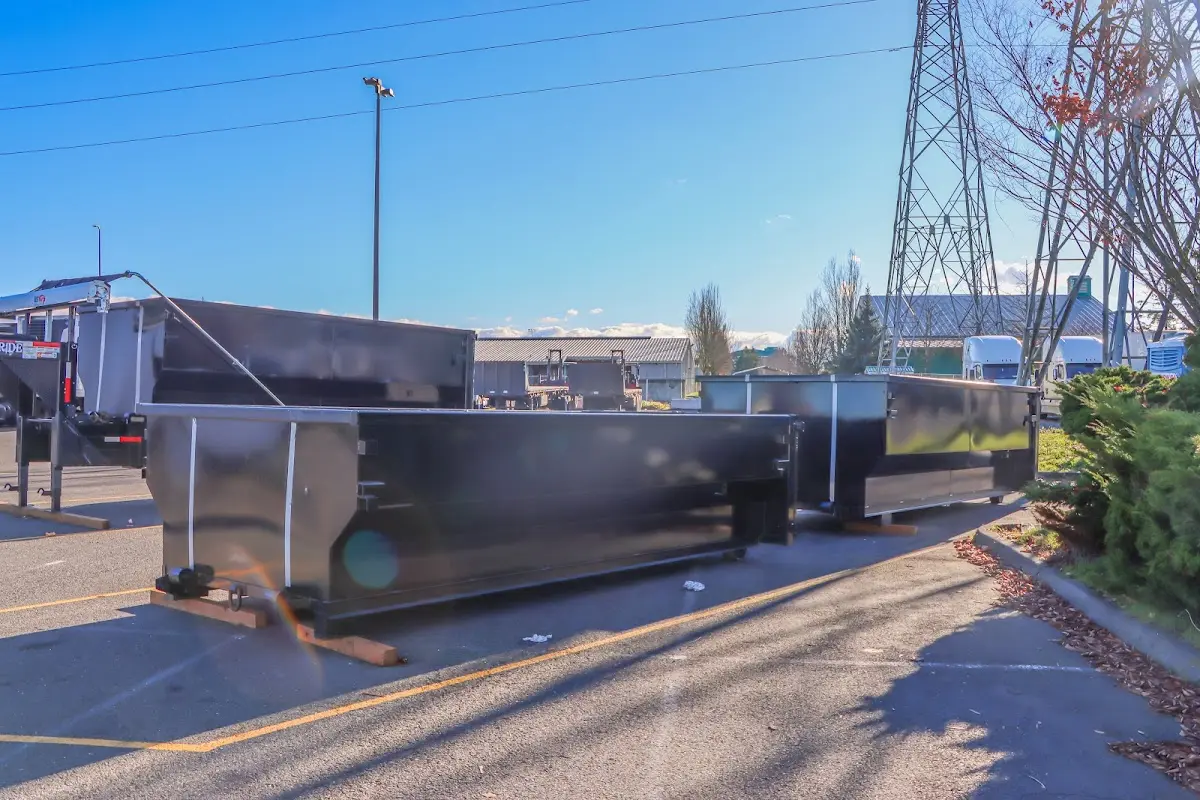 Roll-off dumpster ready for waste disposal at job site for Construction Dumpster Rental in Spanish Lake